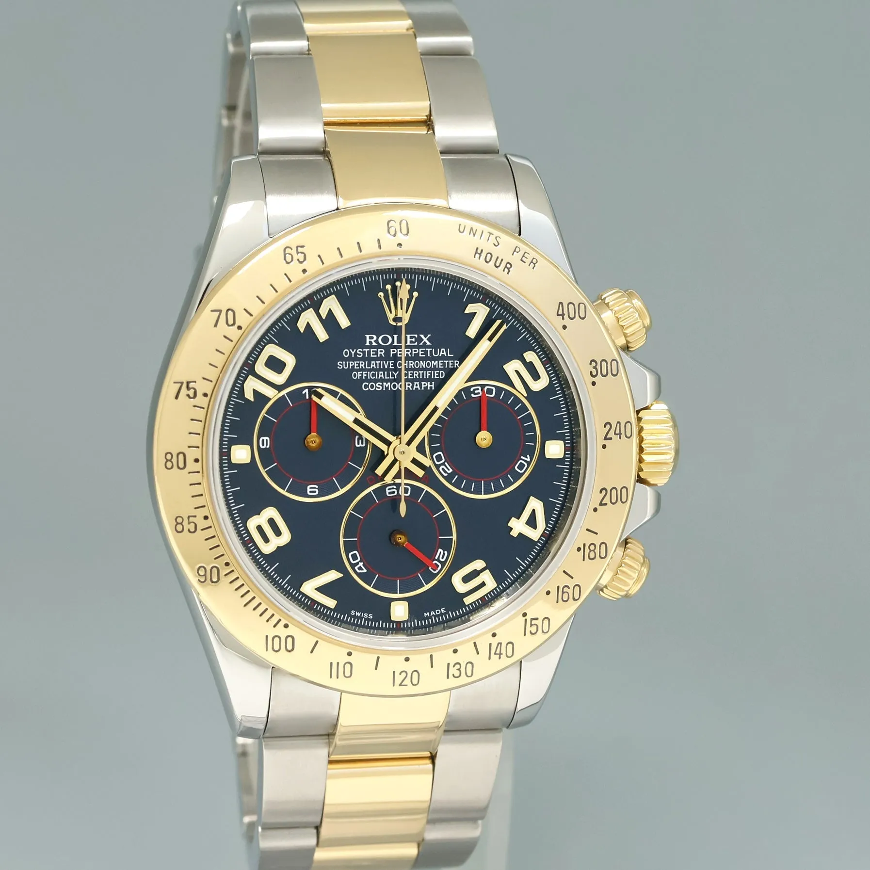 2010 MINT Rolex Daytona 116523 Blue Arabic Red Steel Yellow Gold Two Tone Watch