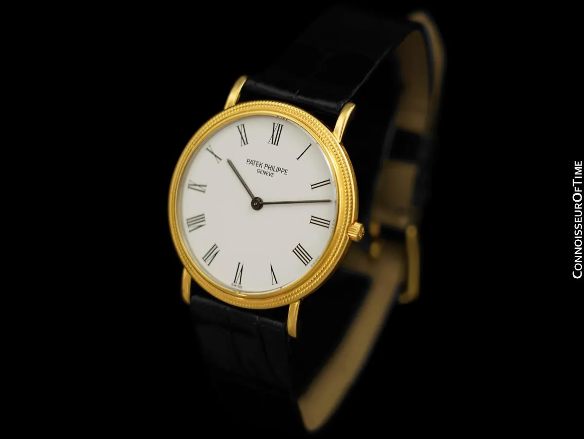 Patek Philippe Calatrava Mens Ultra Thin Watch, Ref. 3744 - 18K Gold with Hobnail Bezel