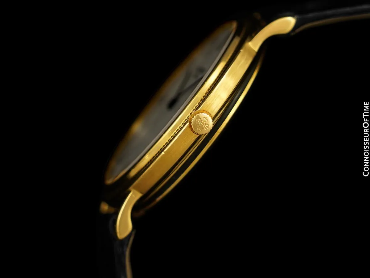 Patek Philippe Calatrava Mens Ultra Thin Watch, Ref. 3744 - 18K Gold with Hobnail Bezel