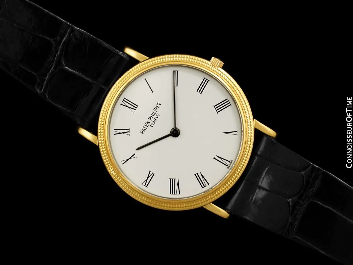Patek Philippe Calatrava Mens Ultra Thin Watch, Ref. 3744 - 18K Gold with Hobnail Bezel