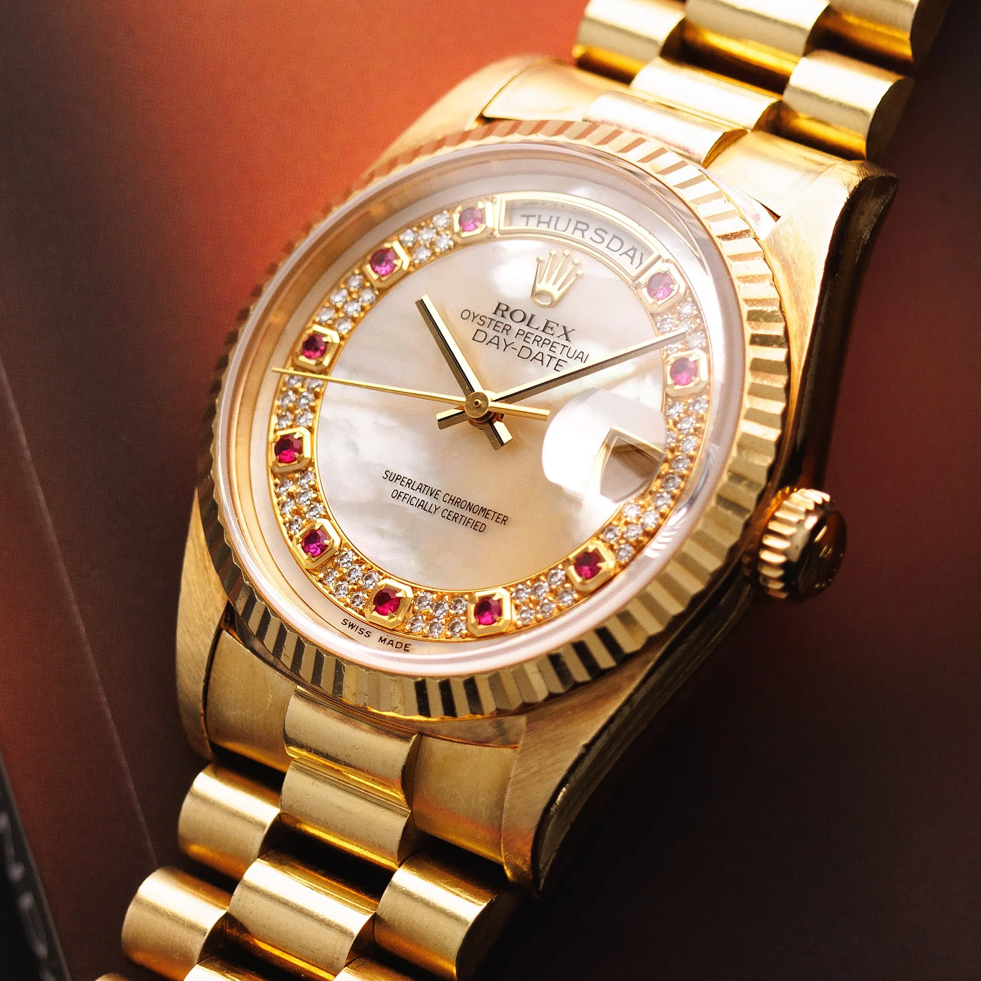 Rolex Yellow Gold Day-Date 18238 with Mother of Pearl and Ruby String Dial