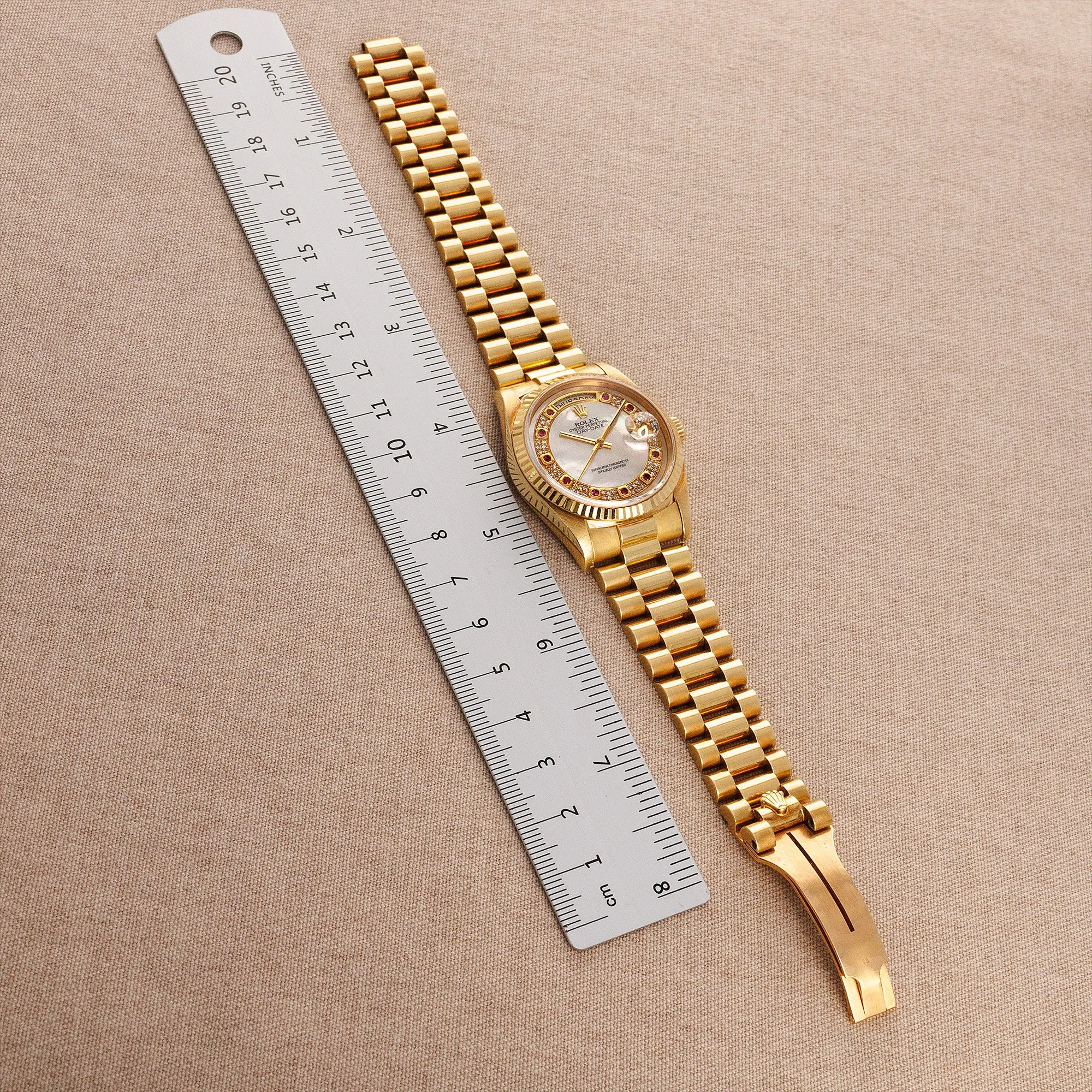 Rolex Yellow Gold Day-Date 18238 with Mother of Pearl and Ruby String Dial