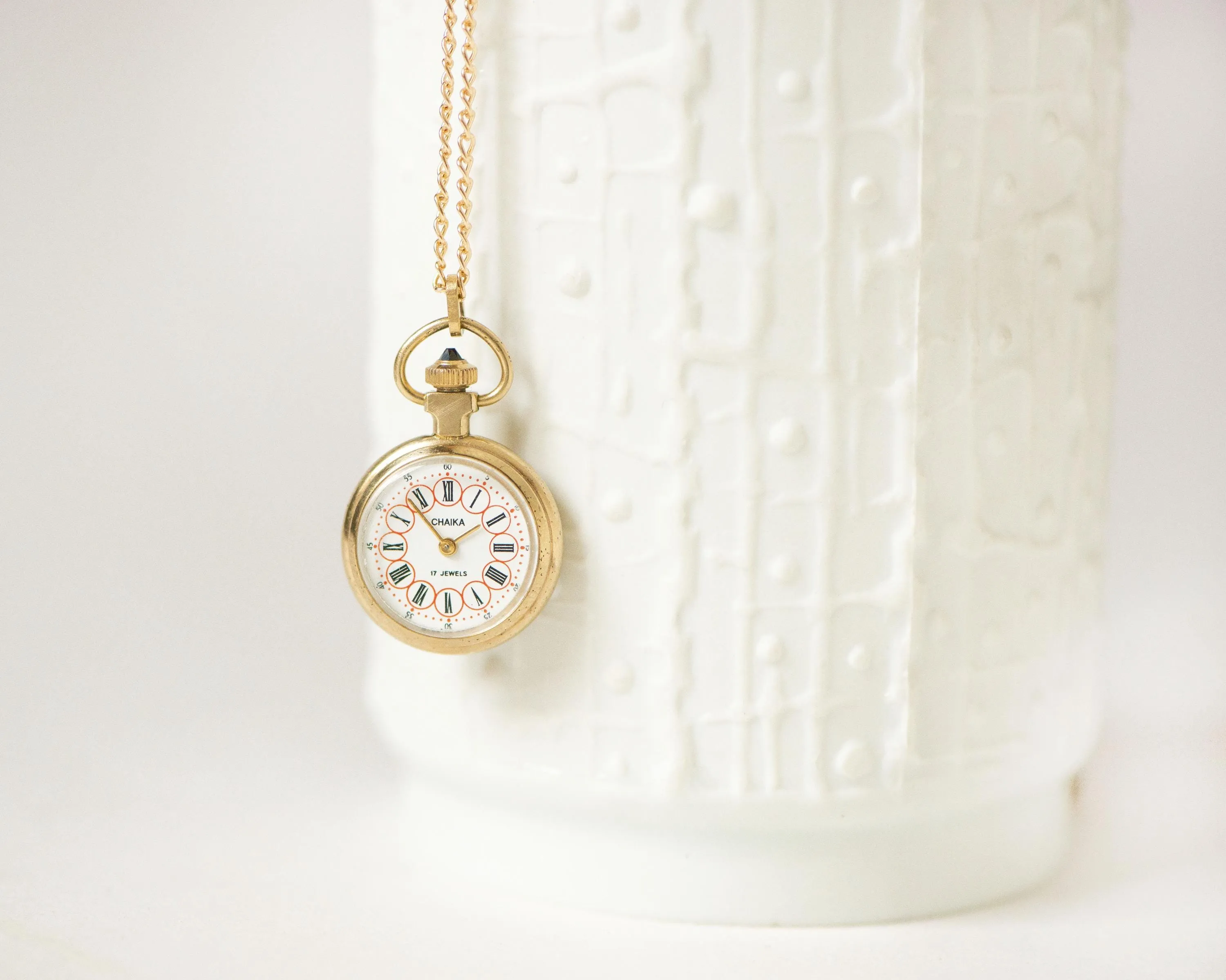 Super small watch necklace Seagull gold plated, lady pendant watch unique Roman numerals dial sunburst case cabochon crown jewelry gift