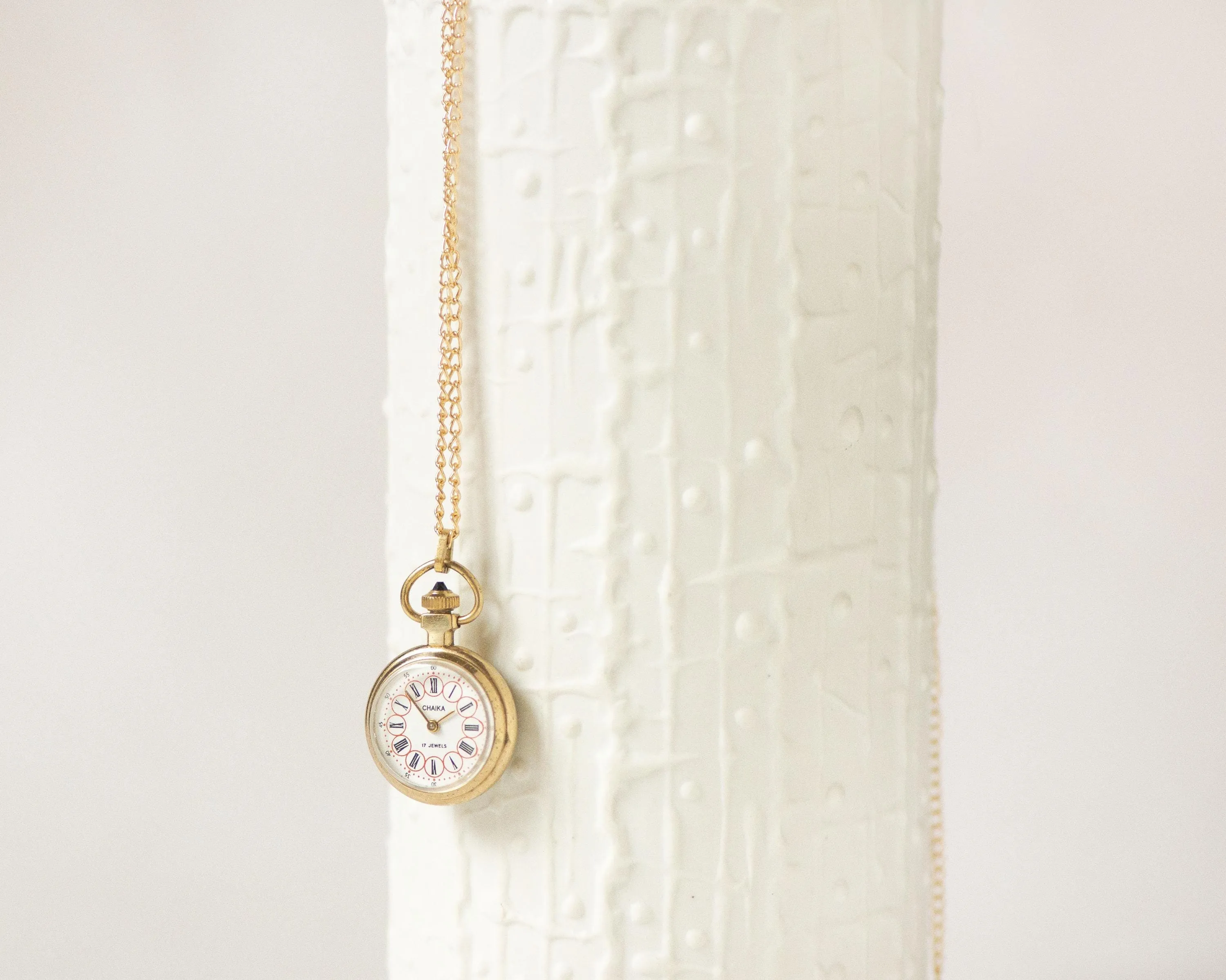 Super small watch necklace Seagull gold plated, lady pendant watch unique Roman numerals dial sunburst case cabochon crown jewelry gift